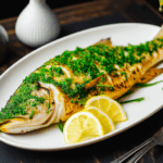 Herb-Crusted Sea Bass with Lemon Butter Sauce